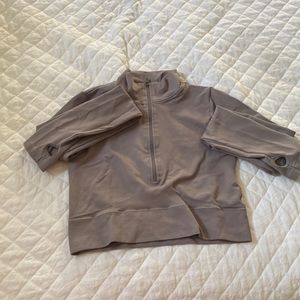 athletic material zip up top